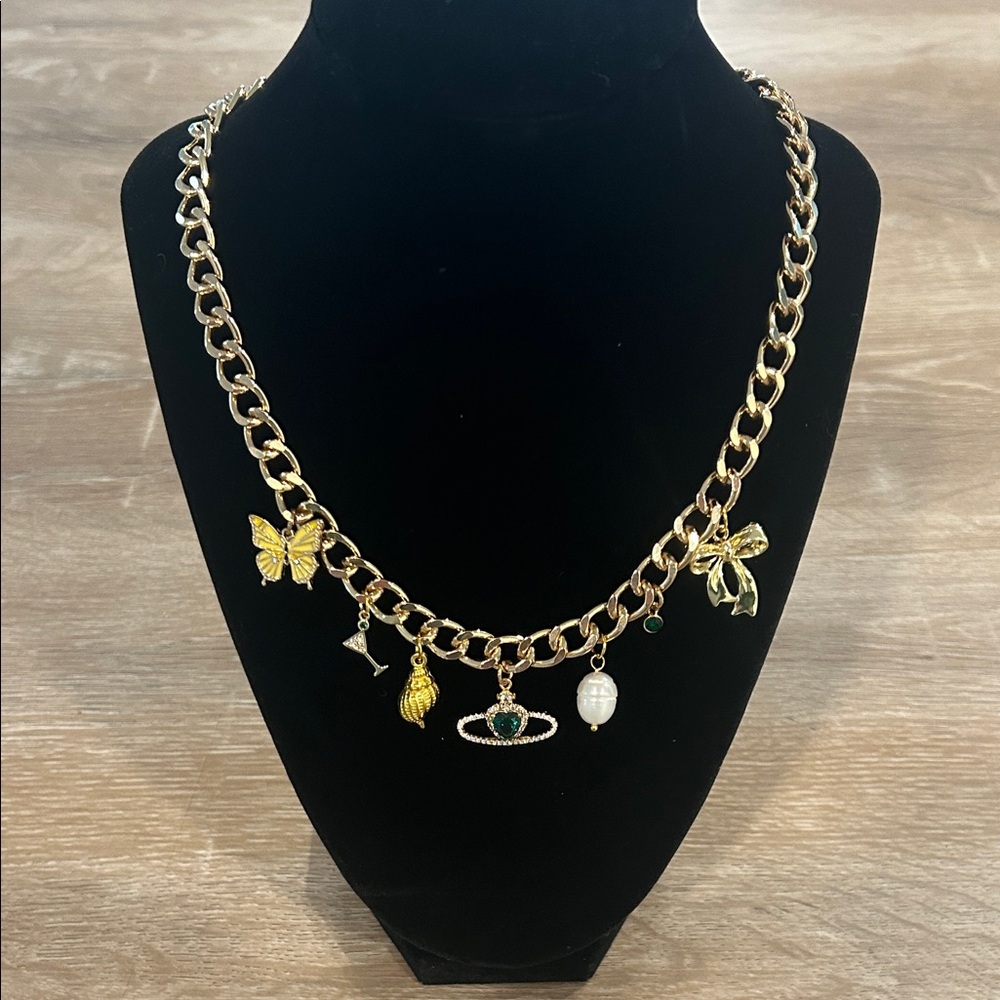 Gold Charm Necklace with Butterfly and Bow Accents